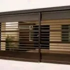 La imagen 1 de la Empresa PUERTAS Y PORTONES DOMÍNGUEZ Servicios Profesionales y de Negocios en Reynosa TAM